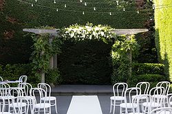 Traditional Luxe Wedding Quat Quatta ceremony set up flower arbour