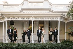 Traditional Luxe Wedding Quat Quatta whole bridal party on the verandah